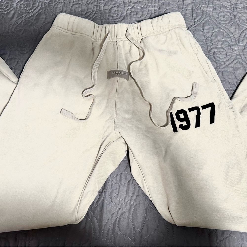 Essentials Cream Sweatpants with Black Print